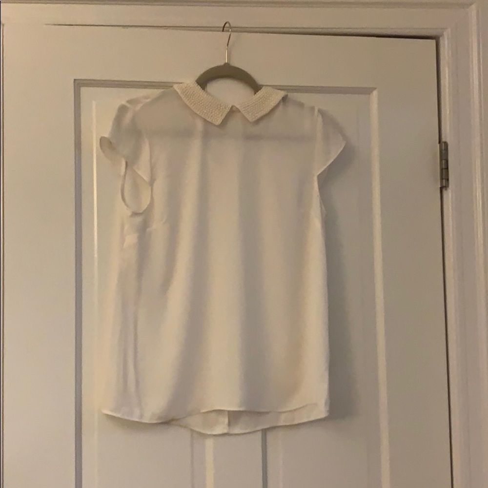 Off-white blouse with pearls in collar